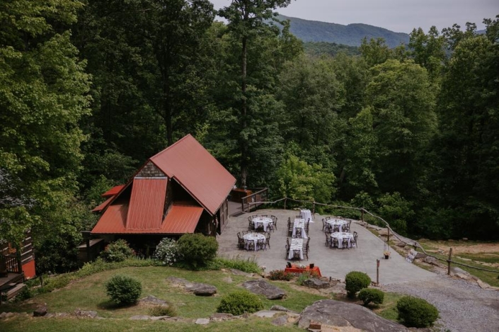 Outdoor wedding reception space near the rustic barn at Laurel Falls