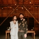 Wedding reception speech inside a rustic barn at Laurel Falls.