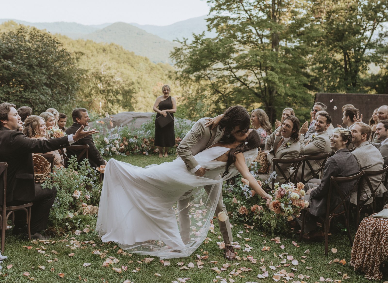 bride-and-groom-dip-kiss-outdoor-wedding-ceremony-laurel-falls-asheville-nc (1)